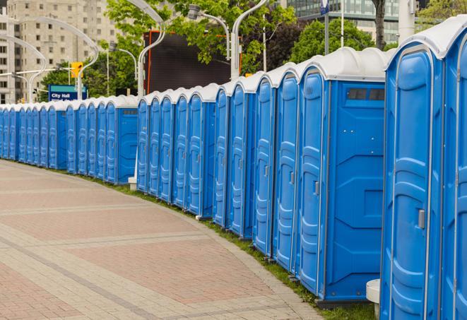 a row of portable restrooms ready for eventgoers in Derby